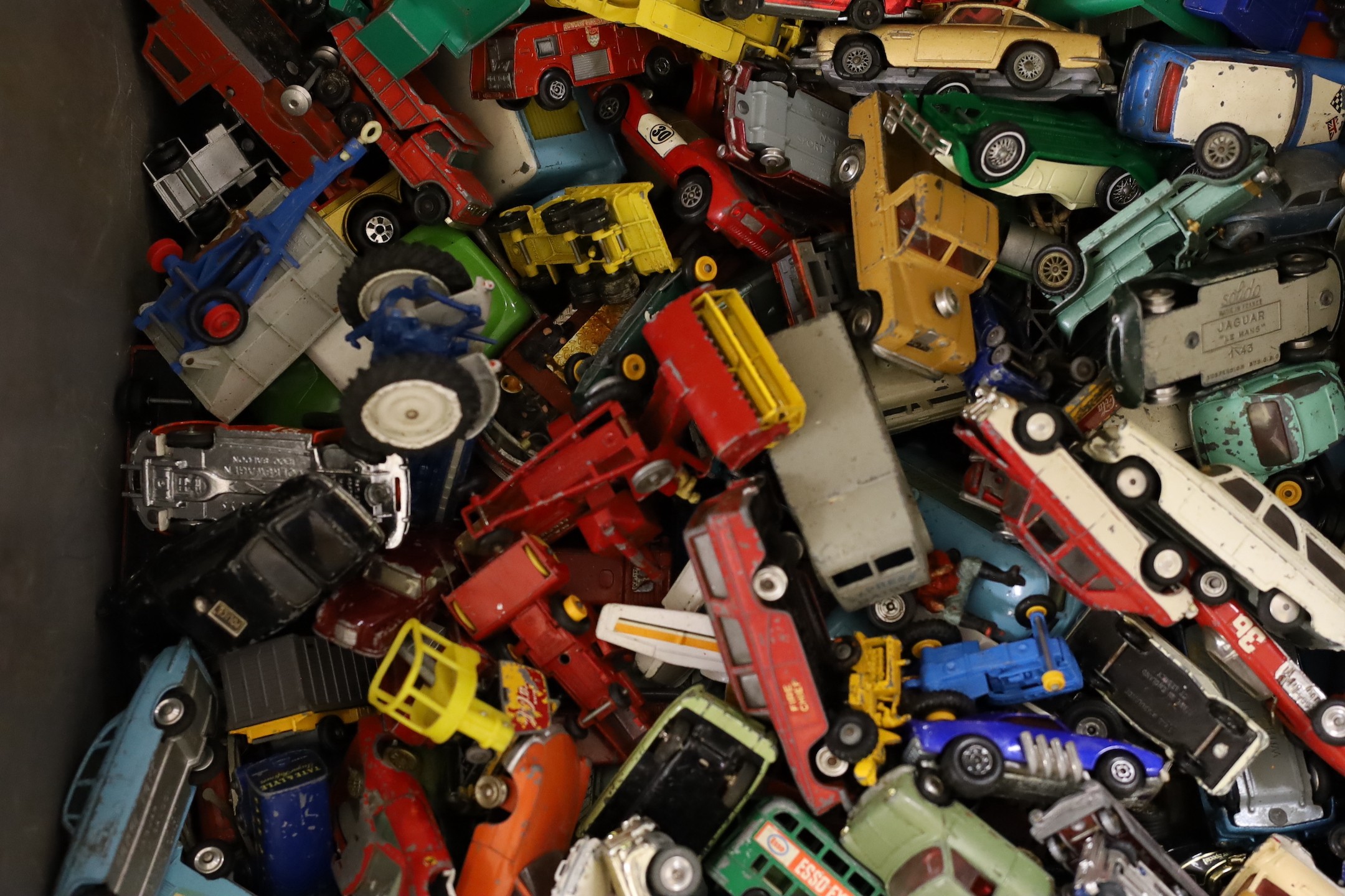 A large collection of used mixed die-cast toys